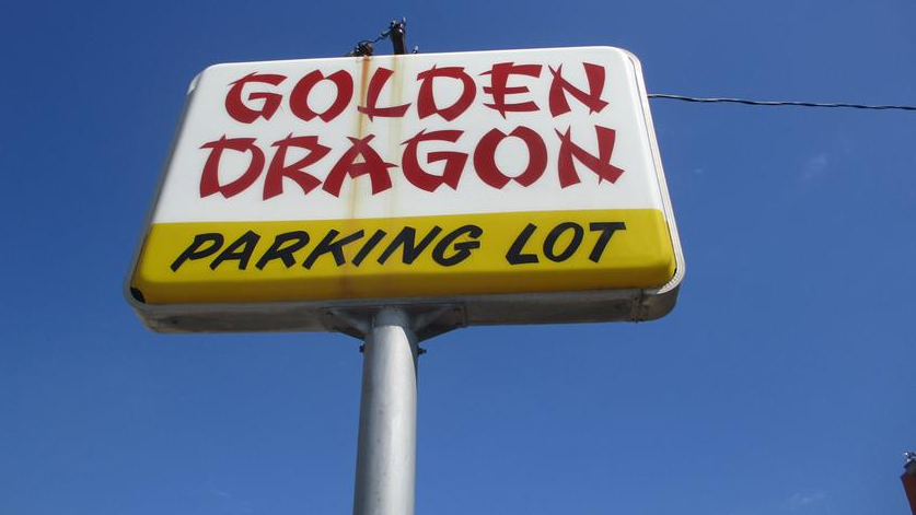 Golden Dragon/ parking sign